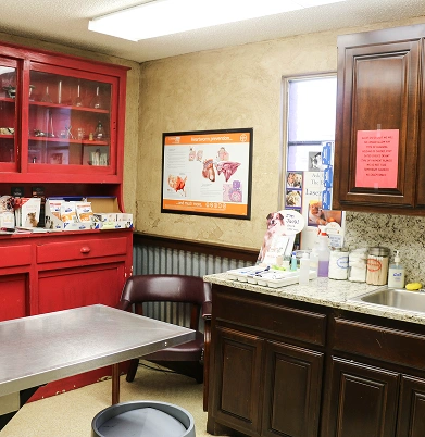 Examination room equipped for veterinary care and pet wellness visits